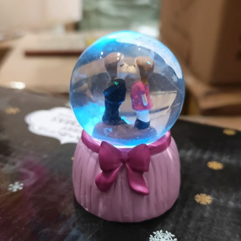 Romantic Couple Crystal Snow Globe – LED Glowing Water Ball with Musical Effect & Floating Snowflakes (Perfect for Gifts) we have more designs